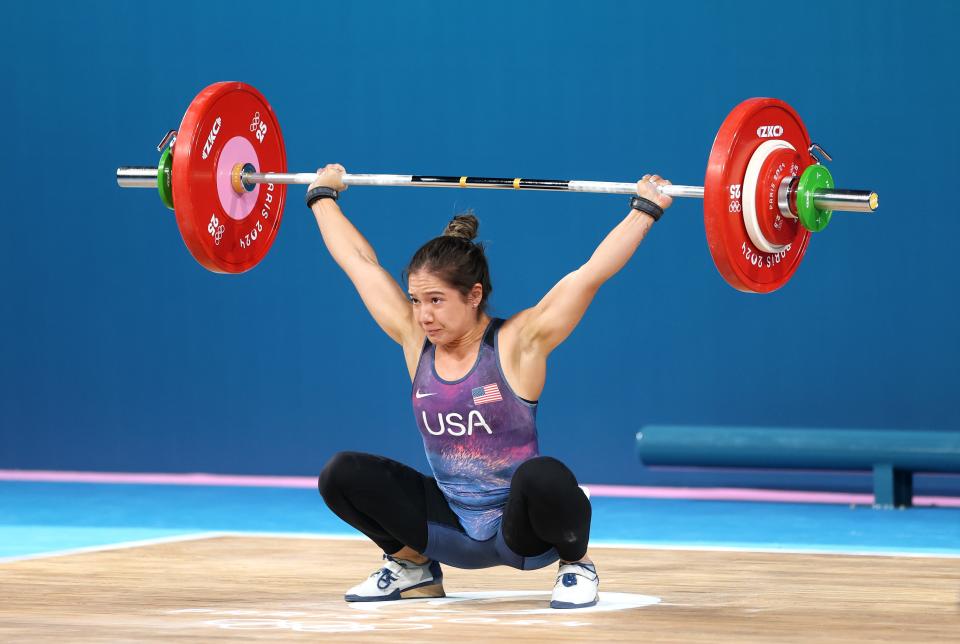 9 Olympic weightlifting photos of lifters making the most intense faces