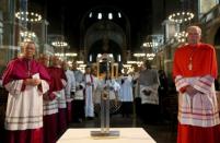 Members of the Catholic church view the Hungarian relic of St Thomas Becket during a ceremony at Westminster Cathedral in London, Britain May 23, 2016. REUTERS/Neil Hall