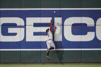 Atlanta Braves center fielder Michael Harris II leaps to catch a fly ball hit by Washington Nationals' Joey Meneses during the third inning of a baseball game Wednesday, Sept. 28, 2022, in Washington. (AP Photo/Nick Wass)