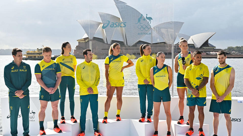 Some of Australia's Olympic Games athletes show off the new uniforms during a March unveiling.