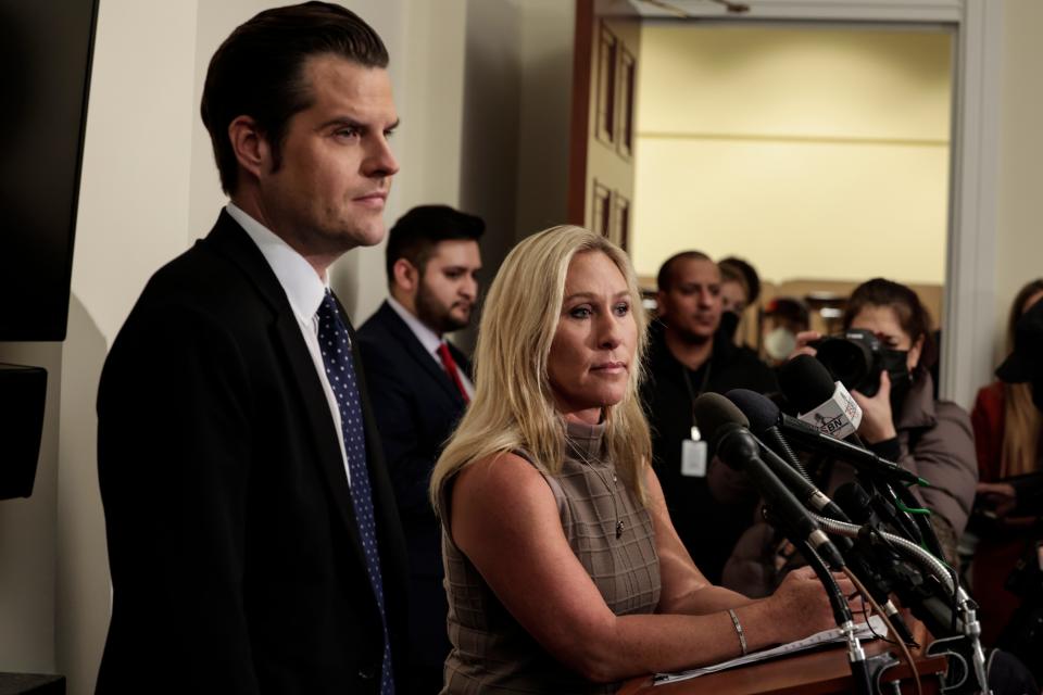 On Jan. 6, 2022, Rep. Matt Gaetz, R-Fla., and Rep. Marjorie Taylor Greene, R-Ga., speak at a news conference.