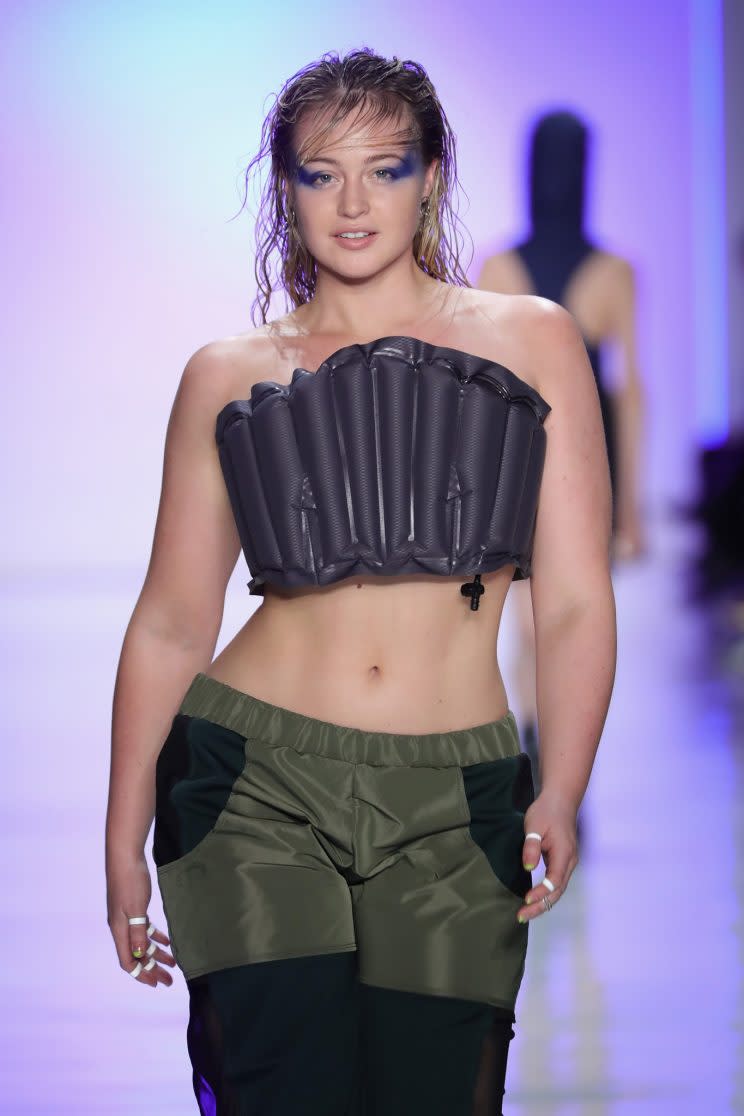 Body-positivity activist Iskra Lawrence models one of Chromat's designs inspired by pool floats. (Photo: Getty Images)