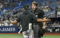 Miami Marlins manager Don Mattingly argues with home plate umpire John Libka, right, after Bryan De La Cruz was ejected during the first inning of a baseball game against the Tampa Bay Rays Friday, Sept. 24, 2021, in St. Petersburg, Fla. (AP Photo/Steve Nesius)