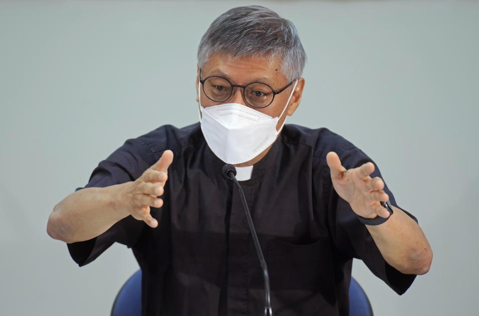 Stephen Chow Sau-yan gestures during a press conference in Hong Kong Tuesday, May 18, 2021. Pope Francis on Monday named a new bishop for Hong Kong, tapping the head of his own Jesuit order in the region, the Rev. P. Stephen Chow Sau-Yan, for the politically sensitive position that has been vacant for two years. (AP Photo/Vincent Yu)