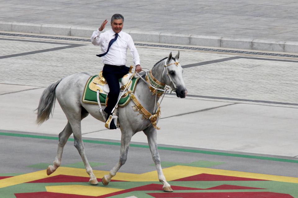 Turkmenistan's President Gurbanguly Berdymukhamedov rides a horse while celebrating the country's 30th independence anniversary in Ashgabat, Turkmenistan, Monday, Sept. 27, 2021. Turkmenistan on Monday marked the 30th anniversary of its independence with a military parade that involved thousands of people. The pomp-filled parade took place in Ashgabat, the capital of the gas-rich former Soviet nation in Central Asia. (AP Photo/Alexander Vershinin)