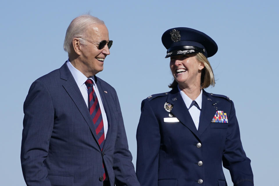 President Joe Biden, escorted by Air Force Col. Angela Ochoa, Commander, 89th Airlift Wing, walks to board Air Force One for a trip to San Francisco to attend the APEC summit, Tuesday, Nov. 14, 2023, in Andrews Air Force Base, Md. (AP Photo/Evan Vucci)