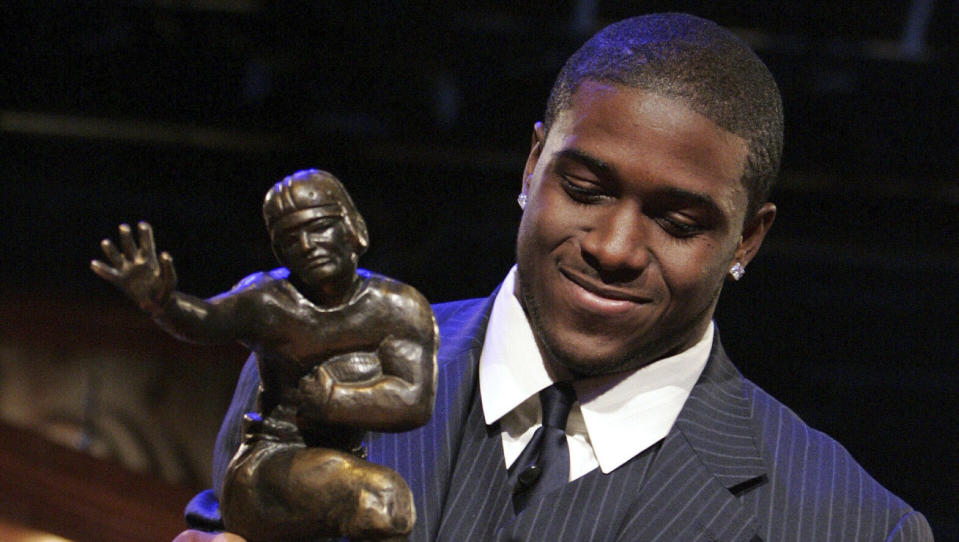 Reggie Bush with his Heisman trophy in 2024