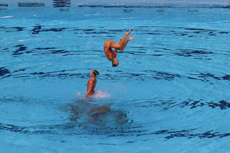 <p>Team Singapore performs during the synchronised swimming team free event on 20 Aug. Singapore won gold in the event, Malaysia took the silver and Indonesia bronze. Photo: Hannah Teoh/Yahoo News Singapore </p>