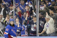 The New York Rangers fans react after center Mika Zibanejad (93) scored against the Montreal Canadiens during the third period of an NHL hockey game, Sunday, April 7, 2024, at Madison Square Garden in New York. (AP Photo/Mary Altaffer)