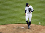 New York Yankees starting pitcher Corey Kluber reacts as the manager heads to the mound to take him out of the baseball game during the sixth inning against the Washington Nationals, Saturday, May 8, 2021, at Yankee Stadium in New York. (AP Photo/Bill Kostroun)