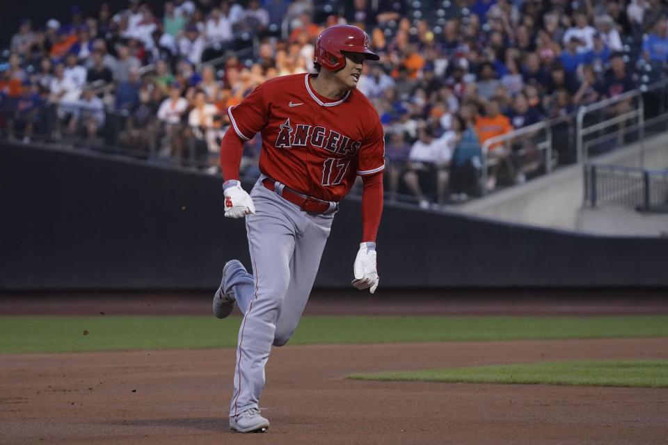 Los Angeles Angels' Shohei Ohtani runs to third base during the first inning of a baseball game against the New York Mets, Saturday, Aug. 26, 2023, in New York. (AP Photo/Bebeto Matthews)