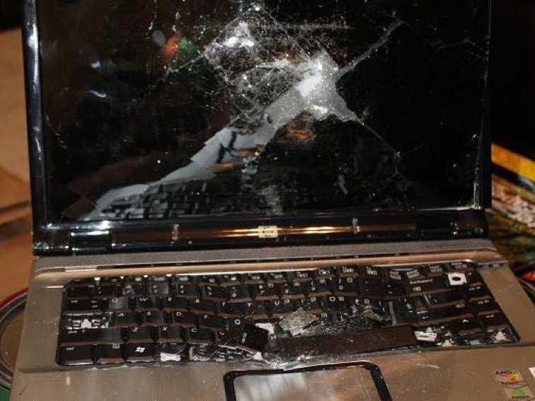 broken smashed laptop computer