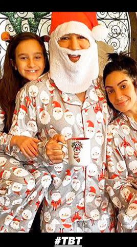 <p>Mario Lopez/Instagram</p> Mario Lopez shares throwback Christmas photo of himself (dressed as Santa), wife Courtney and their daughter Gia