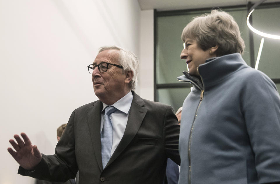 European Commission President Jean-Claude Juncker welcomes Britain's Prime Minister Theresa May at the European Parliament in Strasbourg, eastern France, Monday, March 11, 2019. Prime Minister Theresa May is making a last-ditch attempt to get concessions from EU counterparts on elements of the agreement they all reached late last year. (AP Photo/Jean-Francois Badias, Pool)