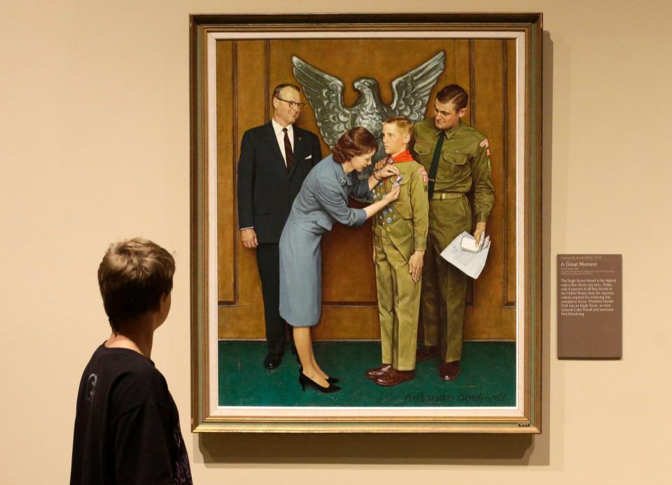 A Boy Scout-themed Norman Rockwell painting is displayed during an exhibition in Salt Lake City. The Boy Scouts of America disclosed in a bankruptcy document that the group owns original Rockwell paintings, which could be sold off to pay sexual abuse victims.