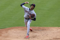 Cleveland Indians' Triston McKenzie throws during the first inning of a baseball game against the Cincinnati Reds in Cincinnati, Saturday, April 17, 2021. (AP Photo/Aaron Doster)