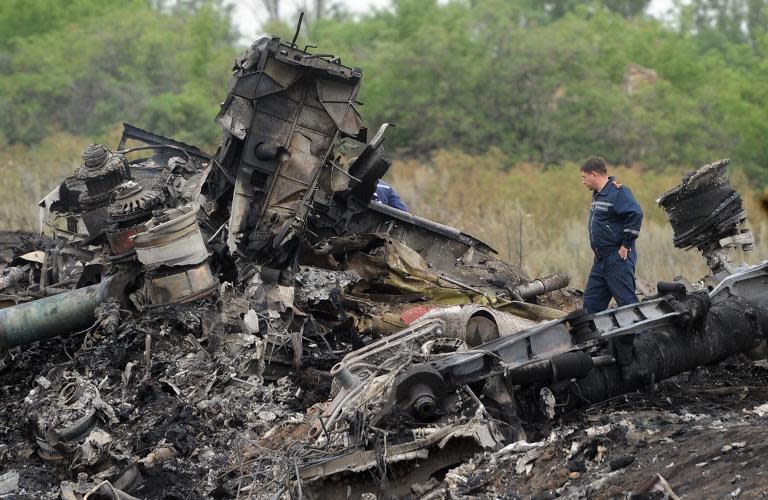 Rescuers at the crash site of Malaysia Airlines flight MH17 near the Ukrainian town of Shaktarsk, on July 18, 2014