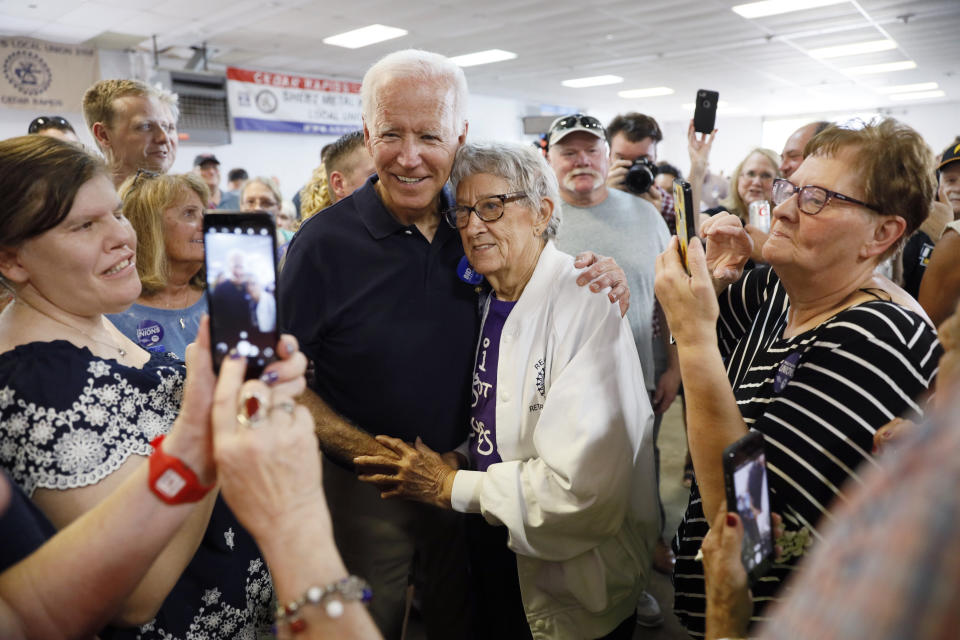 Democratic presidential candidate former Vice President Joe Biden gets a hug from Ruth Nowadzky, of Cedar Rapids, Iowa, during the Hawkeye Area Labor Council Labor Day Picnic, Monday, Sept. 2, 2019, in Cedar Rapids, Iowa.&nbsp; (Photo: ASSOCIATED PRESS)