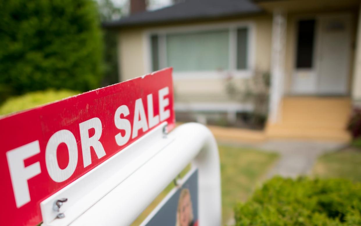 Home sales in Ottawa have hit a lull and real estate industry experts are pointing to a combination of dwindling inventory, rising mortgage rates and static selling prices. (Jonathan Hayward/The Canadian Press - image credit)