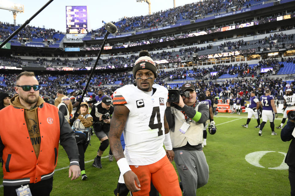 FILE - Cleveland Browns quarterback Deshaun Watson (4) walks on the field after an NFL football game against the Baltimore Ravens, Sunday, Nov. 12, 2023, in Baltimore. Browns quarterback Deshaun Watson will miss the rest of this season after breaking a bone in his right shoulder in Sunday's win over Baltimore — his signature game in two seasons. (AP Photo/Nick Wass, File)