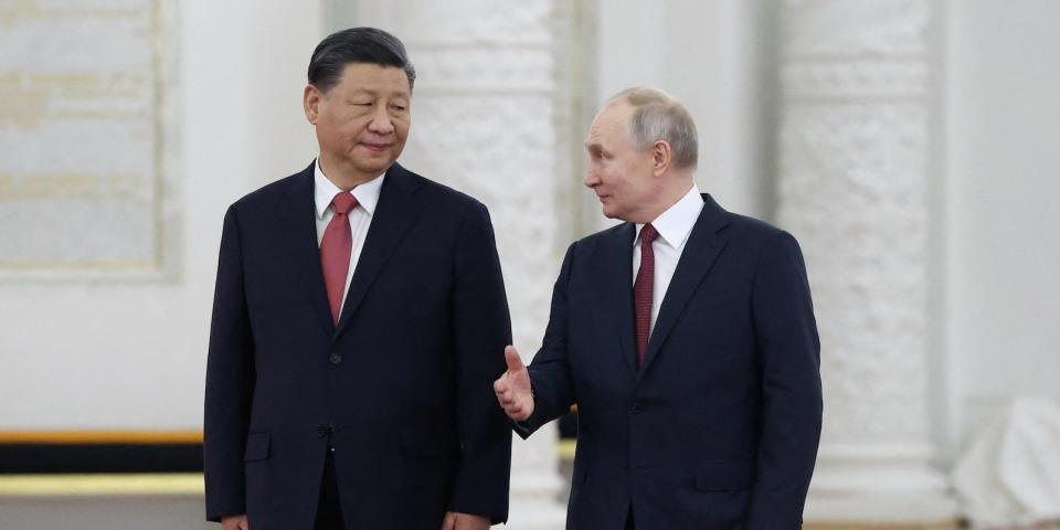 Russian President Vladimir Putin and Chinese President Xi Jinping attend a welcome ceremony before Russia - China talks in narrow format at the Kremlin in Moscow, Russia March 21, 2023