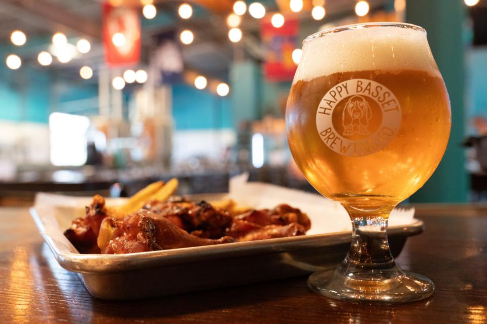 Beers made at Happy Bassett Barrel House pair nicely with newly added Beyond Q BBQ menu items, such as their award-winning buffalo wings.