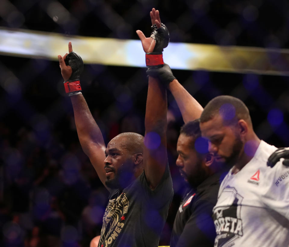 LAS VEGAS, NV - JULY 06: Jon Jones celebrates his win over Thiago Santos of Brazil in their UFC light heavyweight championship fight during the UFC 239 event at T-Mobile Arena on July 6, 2019 in Las Vegas, Nevada.  (Photo by Christian Petersen/Zuffa LLC/Zuffa LLC)