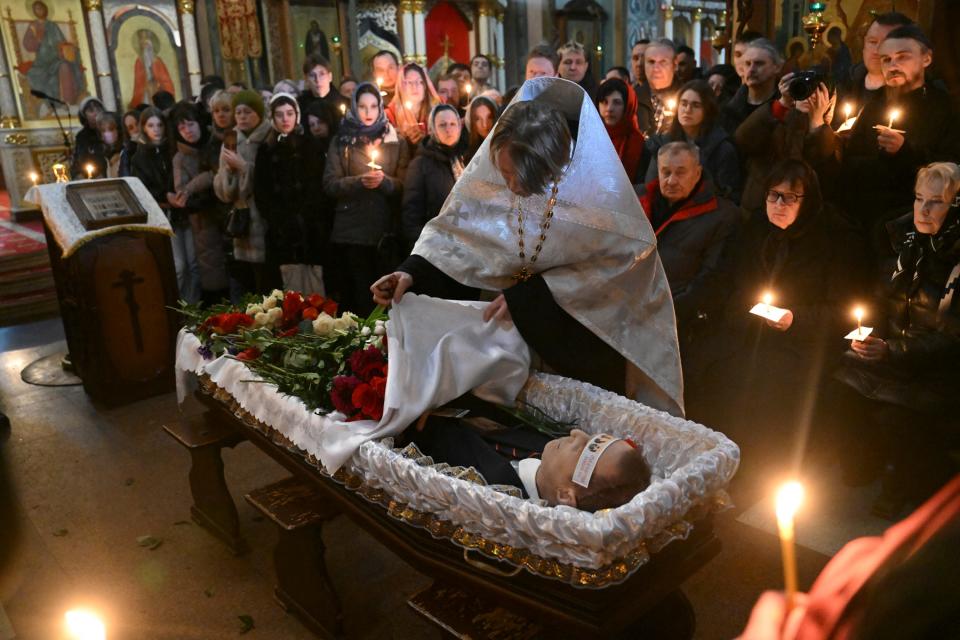 The body of late Russian opposition leader Alexei Navalny is seen during the funeral service at the Mother of God Quench My Sorrows church in Moscow's district of Maryino on March 1, 2024.