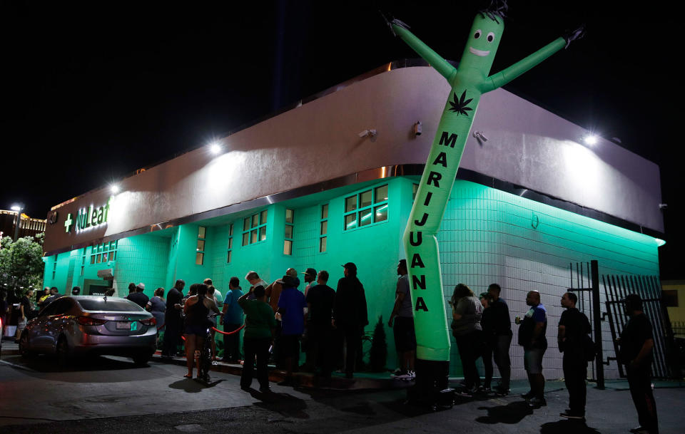 <p>People line up at the NuLeaf marijuana dispensary, Saturday, July 1, 2017, in Las Vegas, Nev. (Photo: John Locher/AP) </p>