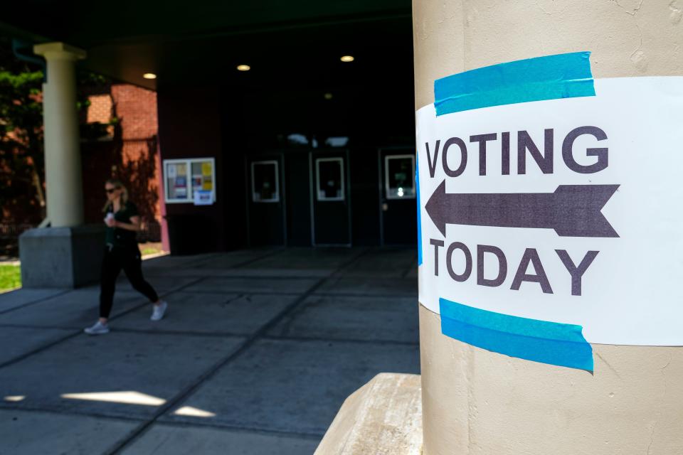 Aug 8, 2023; Columbus, Ohio, USA; Voting signs instruct people where to cast their ballots during a special election for Issue 1 at the Schiller Recreation Center in German Village.