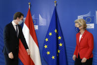 European Commission President Ursula von der Leyen, right, speaks with Austria's Chancellor Sebastian Kurz prior to a meeting at EU headquarters in Brussels, Thursday, Oct. 1, 2020. (Johanna Geron, Pool via AP)