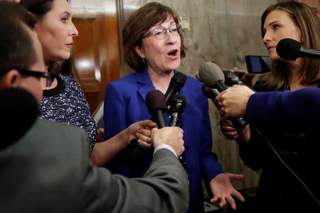 Senator Susan Collins (R-ME), talks to reporters about the Supreme Court nomination of federal appeals court judge Brett Kavanaugh in the wake of a woman's accusation that Kavanaugh sexually assaulted her 36 years ago, on Capitol Hill in Washington, U.S., September 17, 2018. REUTERS/Mike Segar