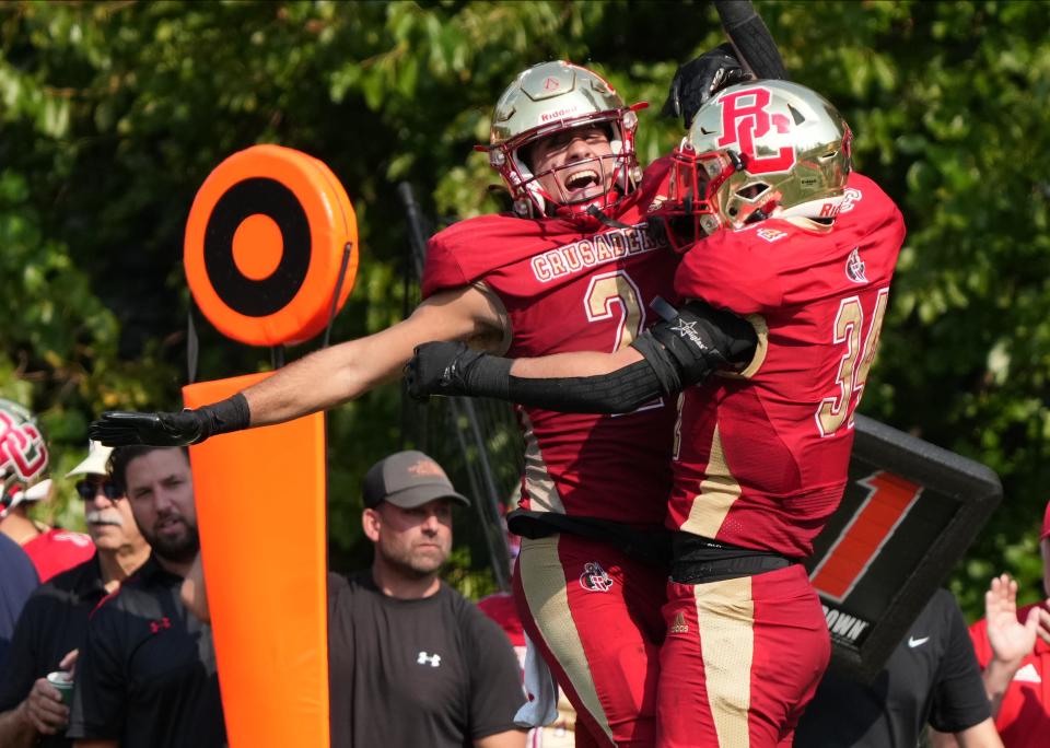 Christian Carti of Bergen Catholic celebrates an  interception by Joseph Barry of Bergen Catholic in the second half as number five Seton Hall Prep came to Oradell, NJ to take on top ranked Bergen Catholic on September 17, 2022.