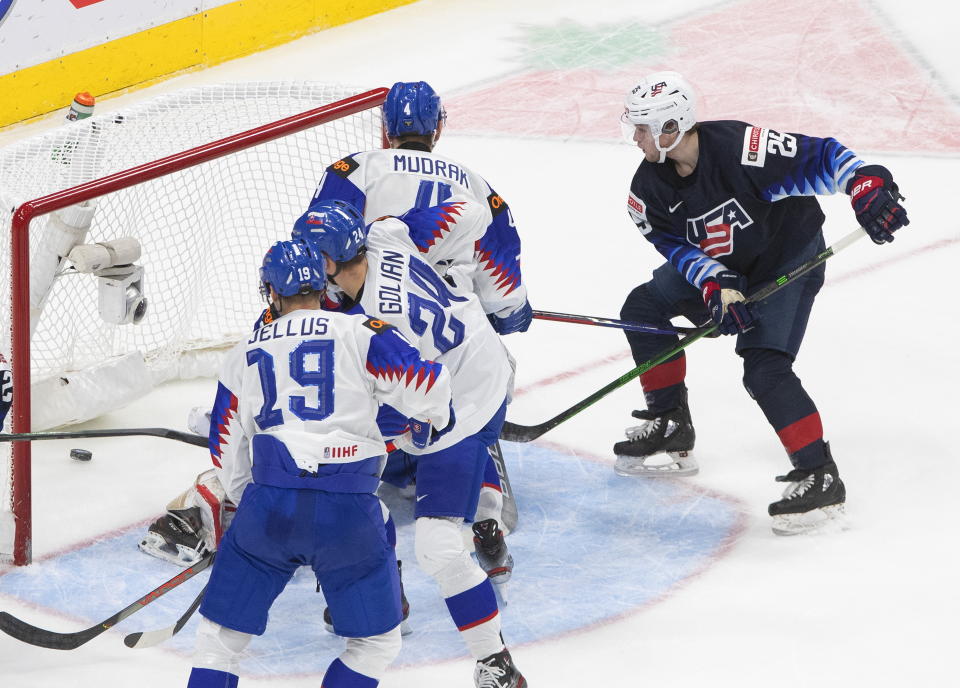 United States' John Farinacci (25) scores a goal against Slovakia during the third period of an IIHL World Junior Hockey Championship game, Saturday, Jan. 2, 2021 in Edmonton, Alberta. (Jason Franson/The Canadian Press via AP)