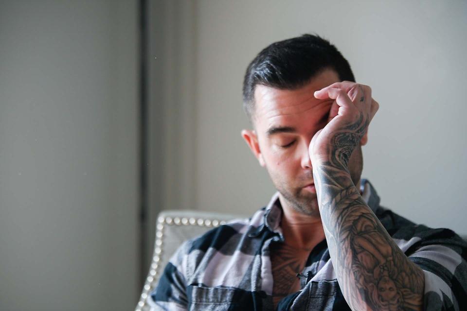 Jay Allen, a contestant on The Voice, stops himself from crying, while talking about his mom before she died from Alzheimers, at his home in Nashville, Tenn., Thursday, Sept. 15, 2022. 