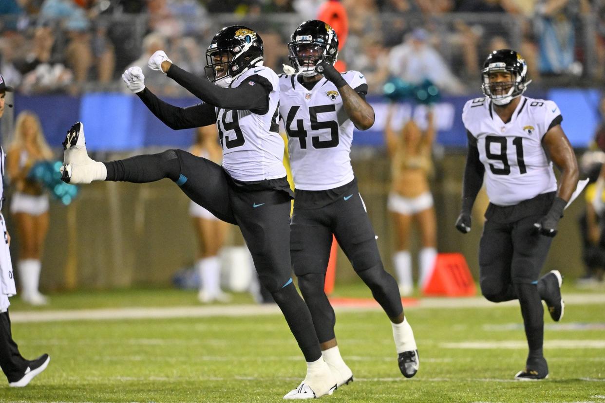 Jacksonville Jaguars defensive end Arden Key (49) celebrates a sack during the first half of the team's preseason game against the Las Vegas Raiders on Thursday.