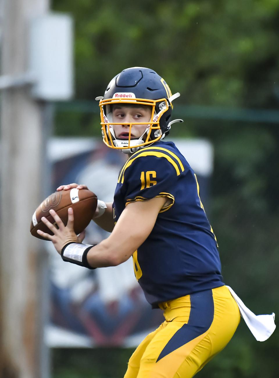 Luke Dunn of Moeller attempts a pass against East Central at Shea Stadium on Saturday, Sept. 3, 2022.