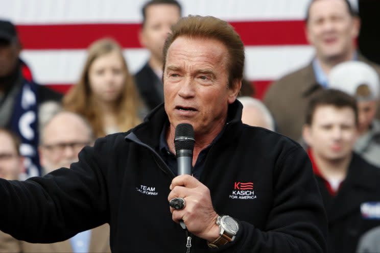 Arnold Schwarzenegger introduces John Kasich during a rally in Columbus, Ohio, in March. (Photo: Jay LaPrete/AP)