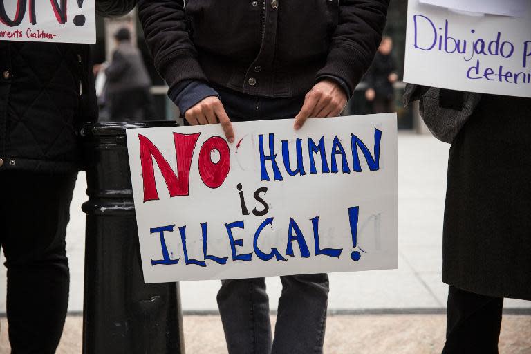 Activists hold a protest on March 24, 2015 outside the Jacob K Javits Federal building, where immigration offices are located, in New York City, calling for the release of detainees and the closure of family detention centers in Texas