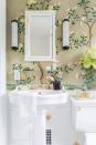 <p>In the bathroom of their <a href="https://www.housebeautiful.com/design-inspiration/house-tours/a26628641/the-happy-tudor-home-tour/" rel="nofollow noopener" target="_blank" data-ylk="slk:Tennessee Home,;elm:context_link;itc:0;sec:content-canvas" class="link ">Tennessee Home,</a> the couple behind The Happy Tudor opted for a scenic Gracie Wallpaper—which made designing the rest of the bathroom simple. They went for classic whites with brass accents so as not to distract from the wall. </p>