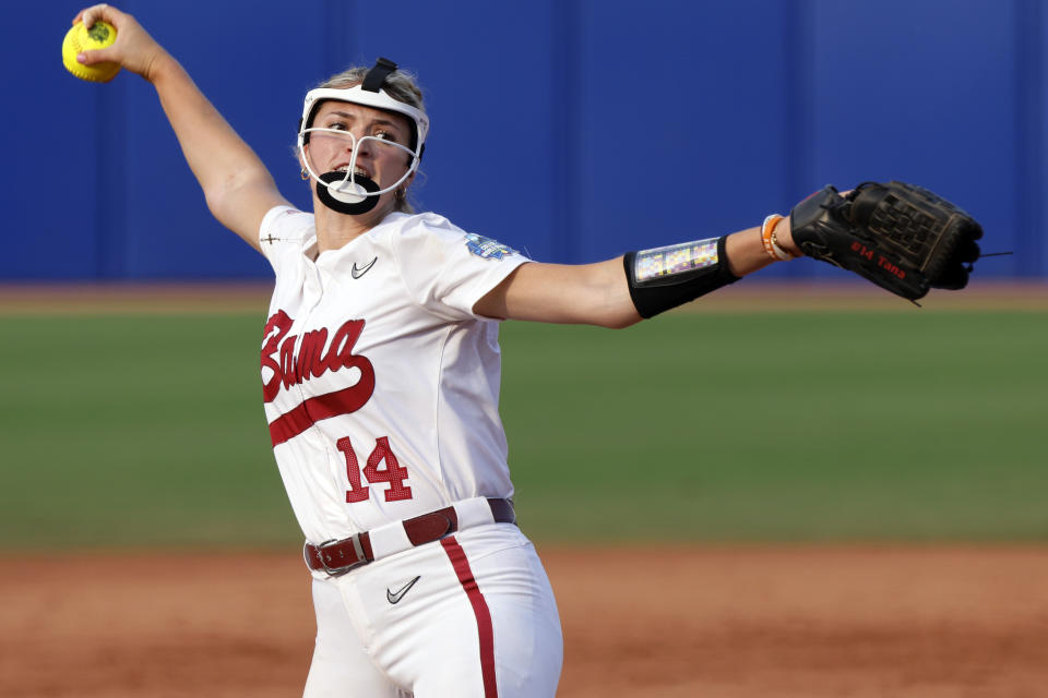 Alabama's Montana Fouts pitches against Stanford during the third inning of an NCAA softball Women's College World Series game Friday, June 2, 2023, in Oklahoma City. (AP Photo/Nate Billings)