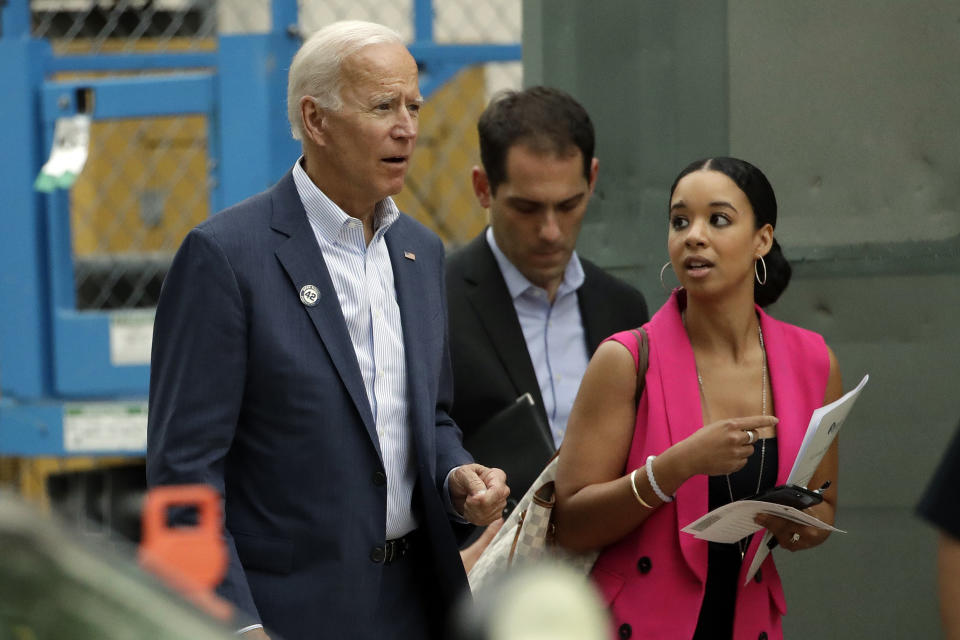 Democratic presidential candidate former Vice President Joe Biden, left, leaves after a visit to Pasadena City College Thursday, Sept. 26, 2019, in Pasadena, Calif. (AP Photo/Marcio Jose Sanchez)