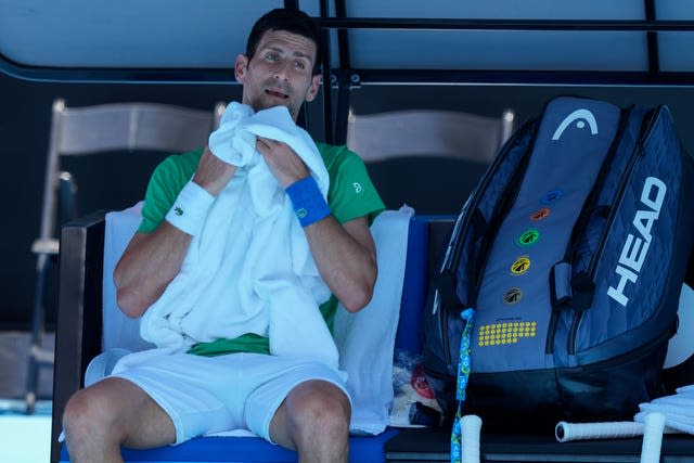 Novak Djokovic feels the heat during his practice session