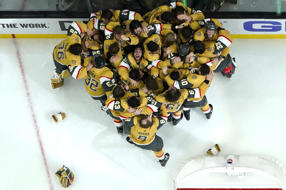 Members of the Vegas Golden Knights celebrate after defeating the Florida Panthers to win the Stanley Cup in Game 5 of the NHL hockey Stanley Cup Finals on June 13, 2023, in Las Vegas. (AP Photo/Abbie Parr)