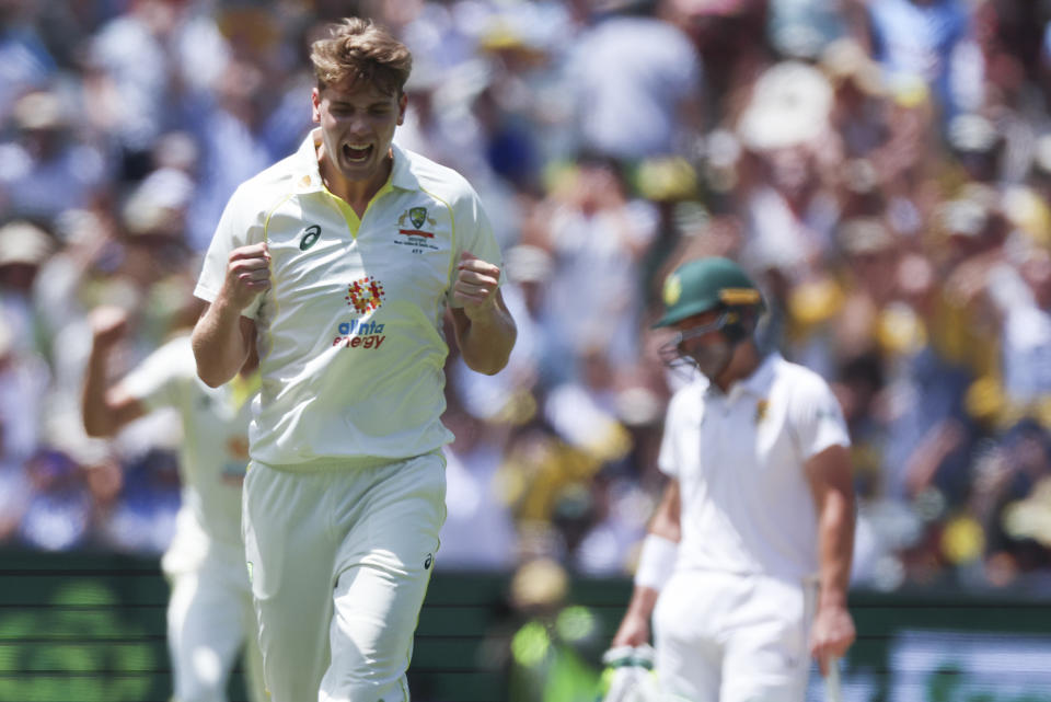 Australia's Cameron Green reacts after taking the wicket of South Africa's Theunis de Bruyn during the second cricket test between South Africa and Australia at the Melbourne Cricket Ground, Australia, Monday, Dec. 26, 2022. (AP Photo/Asanka Brendon Ratnayake)