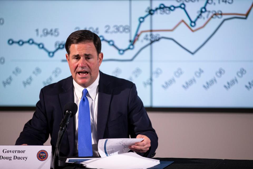 Arizona Gov. Doug Ducey speaks at a press conference about protests and COVID-19 on Thursday at the Arizona Commerce Authority Conference Center in Phoenix.