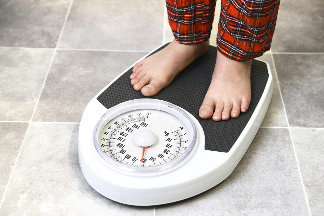 10 year old on bathroom scales