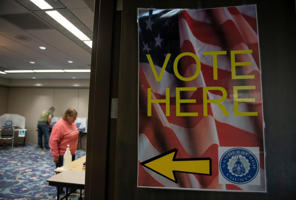 Voters cast their ballots during early voting at Old National Events Plaza in Evansville, Ind., Thursday morning, April 28, 2022.