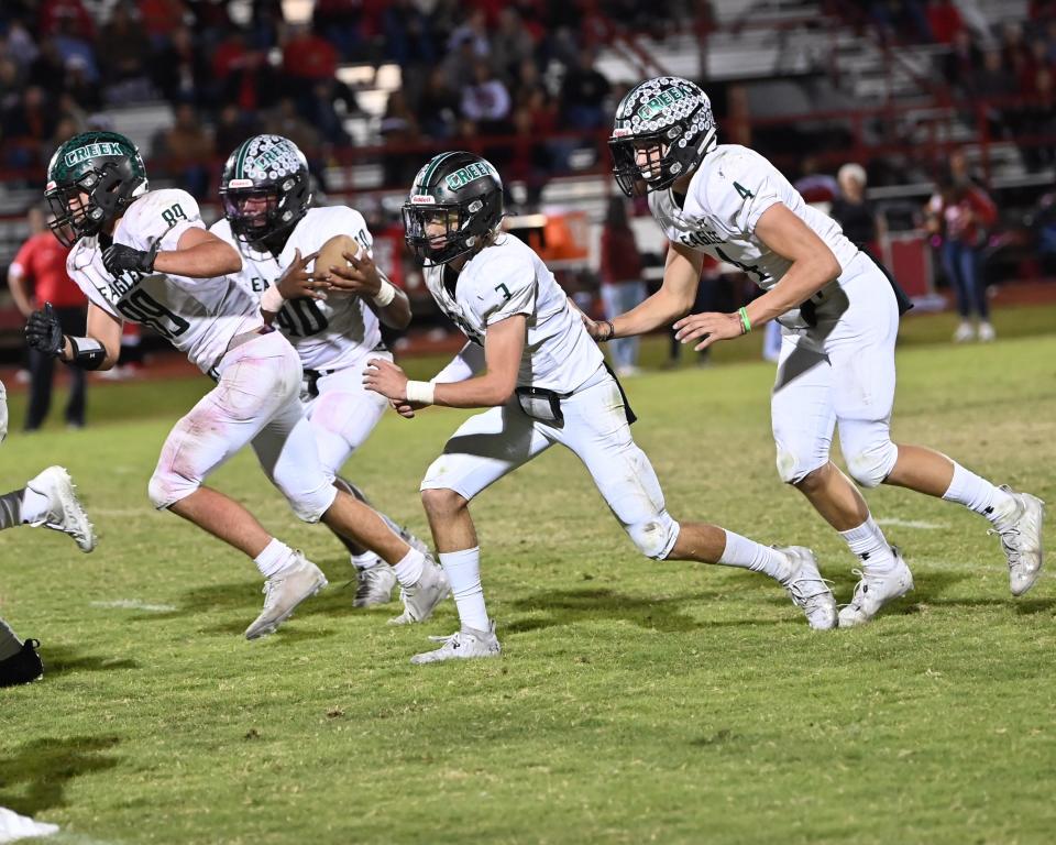 Grape Creek High School's Landon Crow (3) looks to block with his teammates after pitching the ball to Isaiah Briones (40) in a District 2-3A Division II football game against Sonora Friday, Oct. 29, 2021, at Bronco Stadium in Sonora.