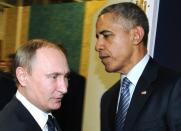 Russian President Vladimir Putin (L) spoke over the phone with US President Barack Obama about the situation in Syria